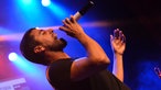 Balkan Beat Box Sänger am Mikrophon