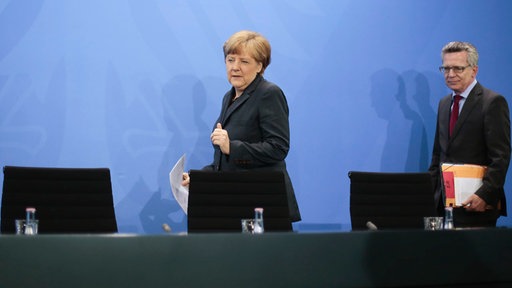 Kancelarka Angela Merkel i ministar unutarnjih poslova Thomas de Maiziere