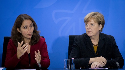 Ajdan Özoguz i Angela Merkel